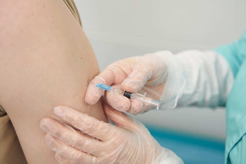 Types of Birth Control Available in Malaysia 8 man being vaccinated by professional in clinic 2023 11 27 05 12 14 utc